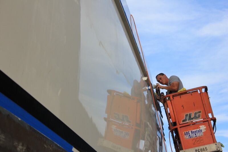 YSR crew applying coating